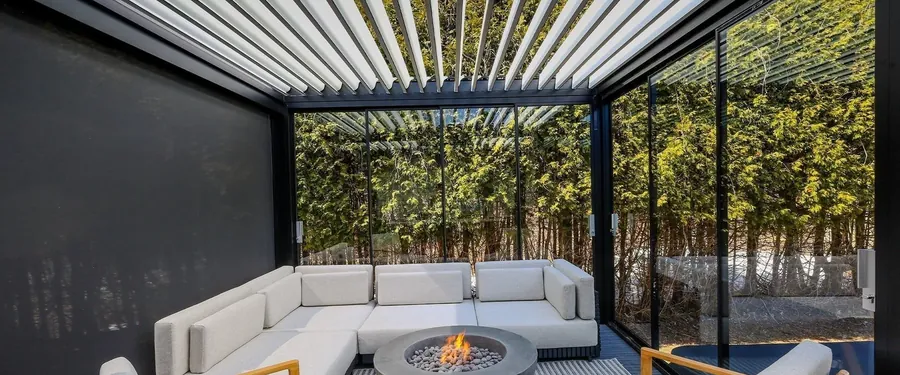 Capri bioclimatic pergola with adjustable louvres and sliding glass, Harvey project