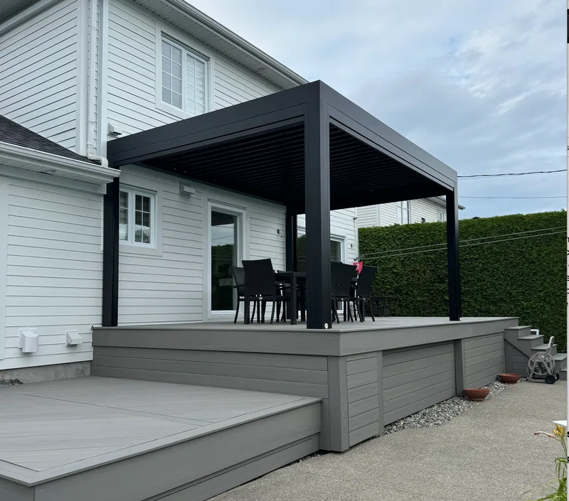 Bioclimatic pergola installed by Pergolas Signature on a terrace rebuilt by DMC2 Construction
