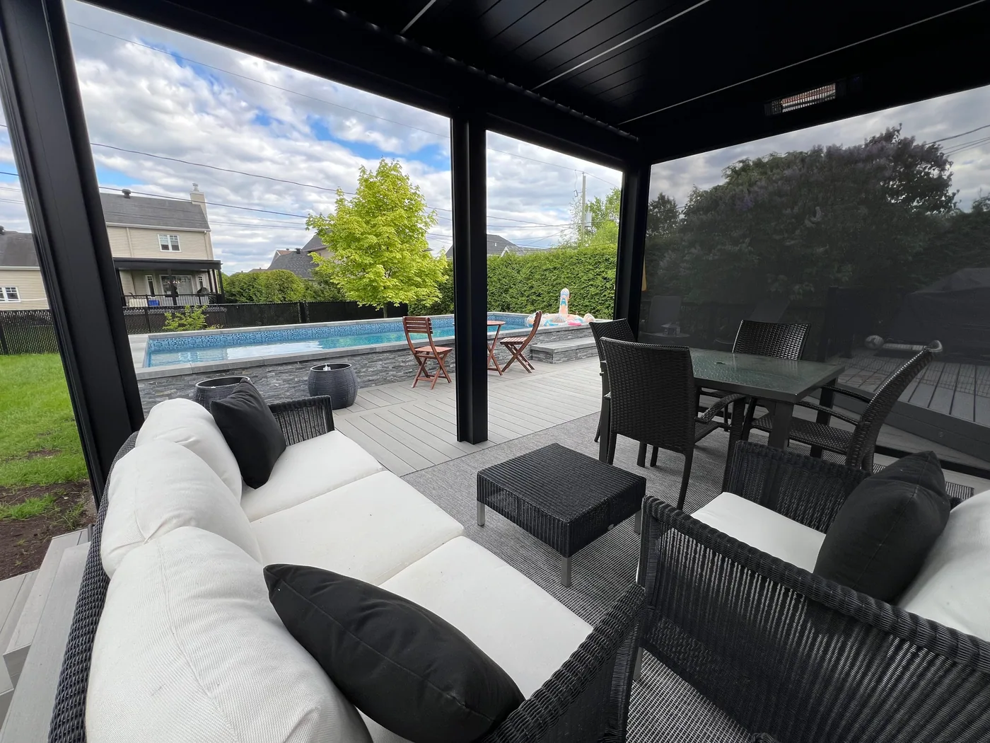 Dining area set up under the Capri pergola, Charlesbourg
