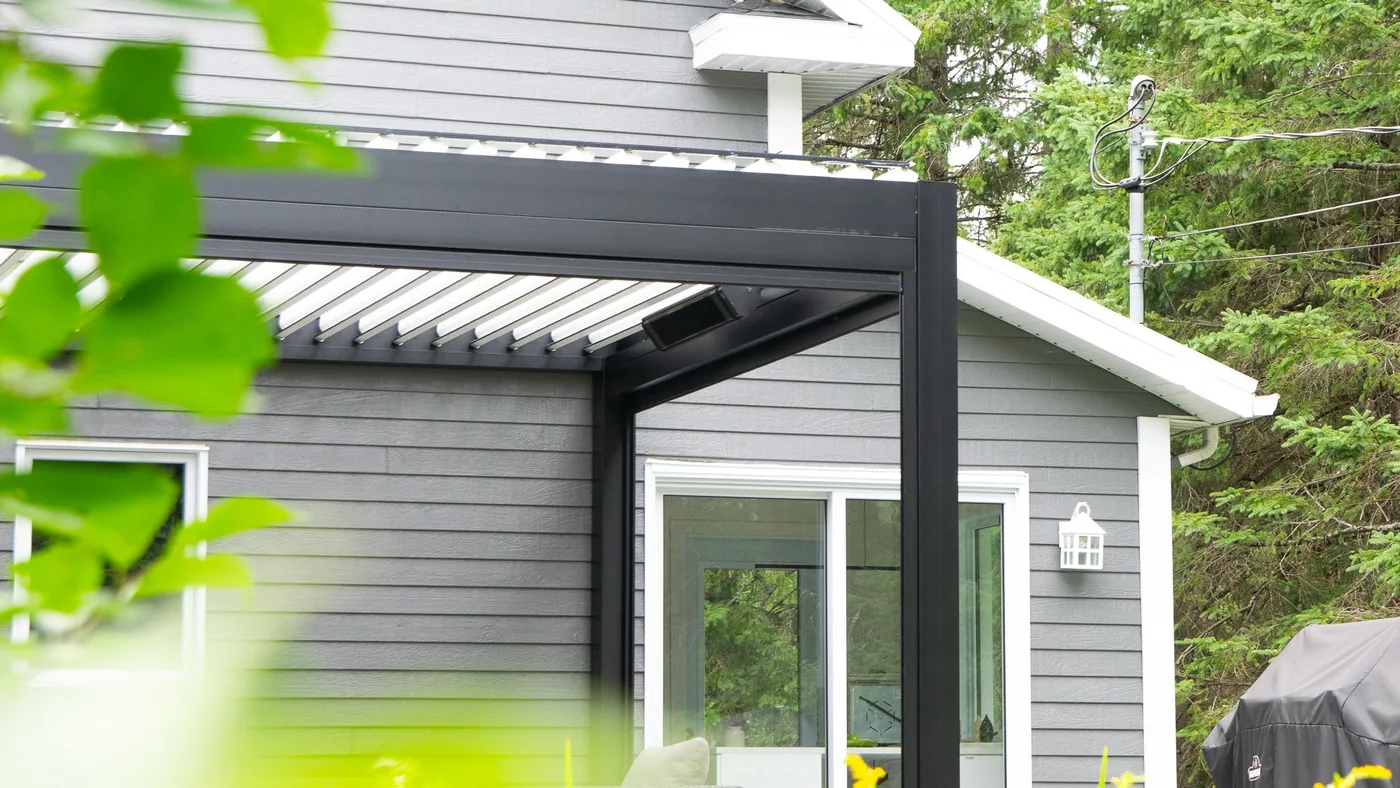 Motorised solar shades lowered on the Provence pergola