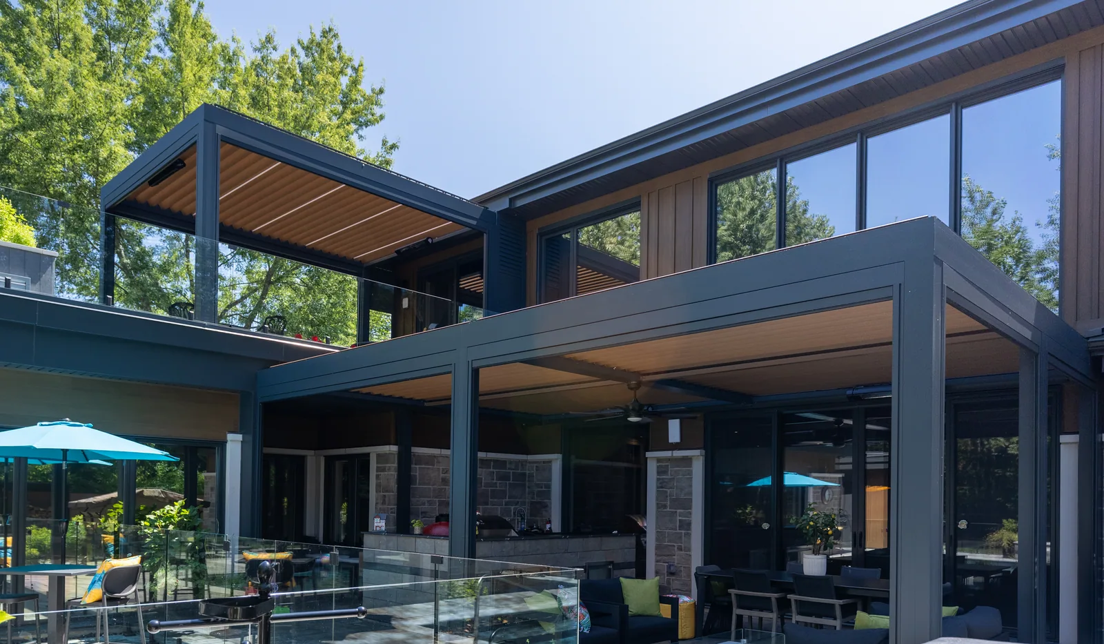 Multi-generational home in Carignan with a Capri pergola upstairs and another on the ground floor