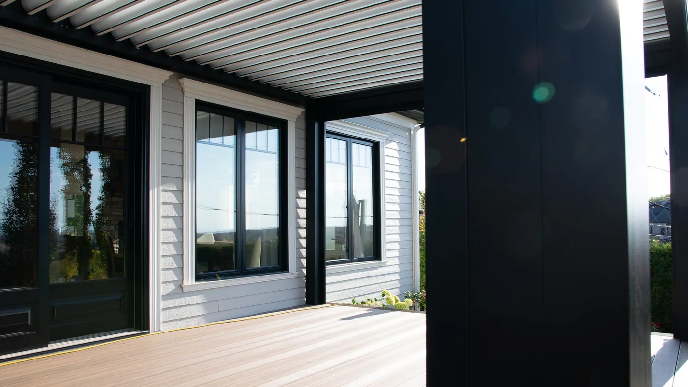 Outdoor shades lowered along the Capri pergola, Rimouski